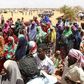 Displaced people wait to receive for non-food items from the United Nations High Commissioner for Refugees at the Kabasa transit centre for the internally displaced people in Dollow town, along the Somalia-Ethiopia border, August 30, 2011. REUTERS/Thom...