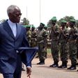 Benin's former president Mathieu Kerekou inspects a guard of honour in the Nigeria-Benin border town of Seme Krake, in a file photo. REUTERS/George Esiri