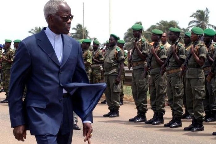 Benin's former president Mathieu Kerekou inspects a guard of honour in the Nigeria-Benin border town of Seme Krake, in a file photo. REUTERS/George Esiri