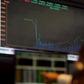 A man looks at an electronic board showing the graph of the recent fluctuations of market indices of Bovespa (Sao Paulo Stock Exchange) in downtown Sao Paulo, Brazil, September 10, 2015. REUTERS/Paulo Whitaker