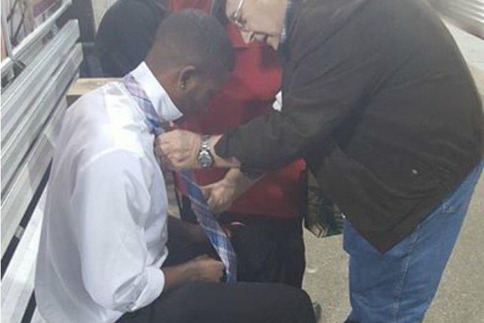 Viral picture of elderly couple helping young man with his tie would make you cry