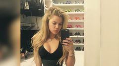 Khloe Kardashian shows off tiny waist