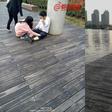 A group of employees were forced by their boss to crawl around a wooden path as punishment for failing to meet their sales targets.