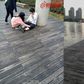 A group of employees were forced by their boss to crawl around a wooden path as punishment for failing to meet their sales targets.
