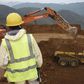 Employees stand in an open pit at Banro's Twangiza mine in eastern Congo, September 28, 2011.   REUTERS/Tom Kirkwood
