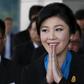 Former Thai PM appears at Supreme Court over doomed rice subsidy scheme