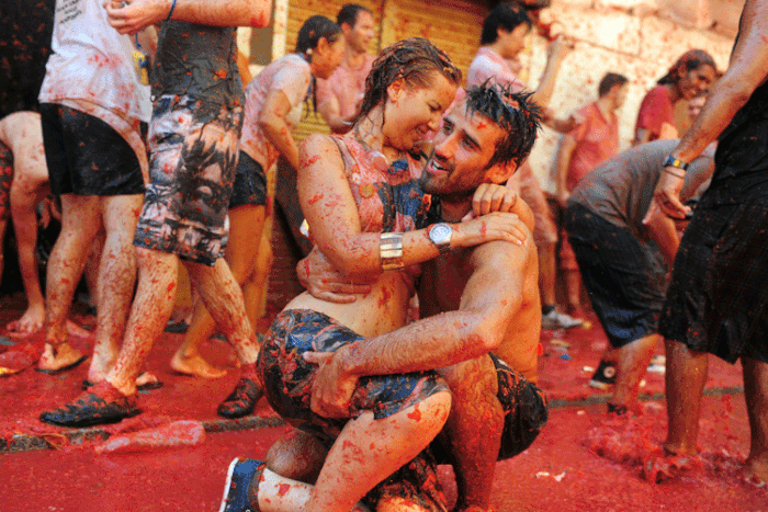 August 26, is the 70th anniversary of La Tomatina, the yearly Spanish tomato-throwing festival that attracts tens of thousands to the tiny town of Buñol, Spain.