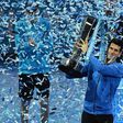 Djokovic ends year on high with Finals win over Federer
