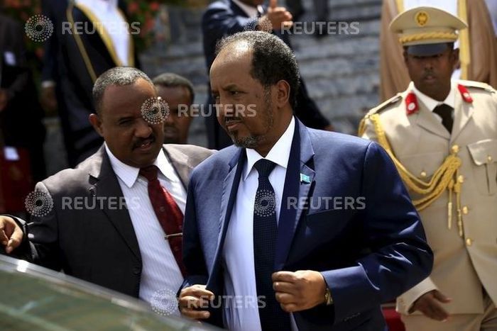 Somalia's President Hassan Sheikh Mohamud (C) walks out after attending Sudan's President Omar Hassan al-Bashir (not pictured) inauguration ceremony at National Assembly in Omdurman, June 2, 2015. REUTERS/Mohamed Nureldin Abdallah