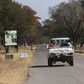 A vehicle carries visitors arriving at Zimbabwe's Hwange National Park, August 2, 2015. REUTERS/Philimon Bulawayo