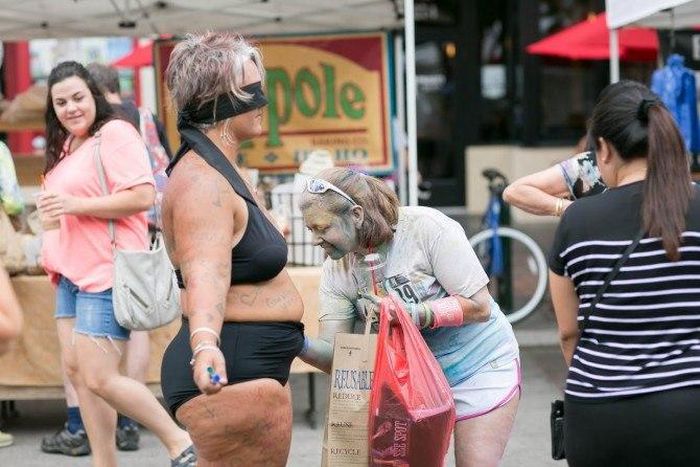 Amy, a mother of four from Boise, has caused a stir on the Internet for stripping down to a bikini, blindfolding herself, and inviting strangers to write on her nearly naked body.