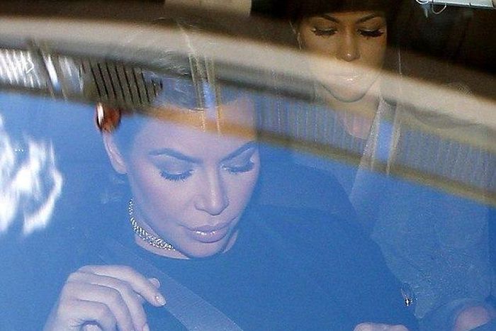 Kim and Kourtney Kardashian seen visiting Lamar Odom at Cedars-Sinai Hospital in LA as Kendall makes VS Fashion Show debut in NYC