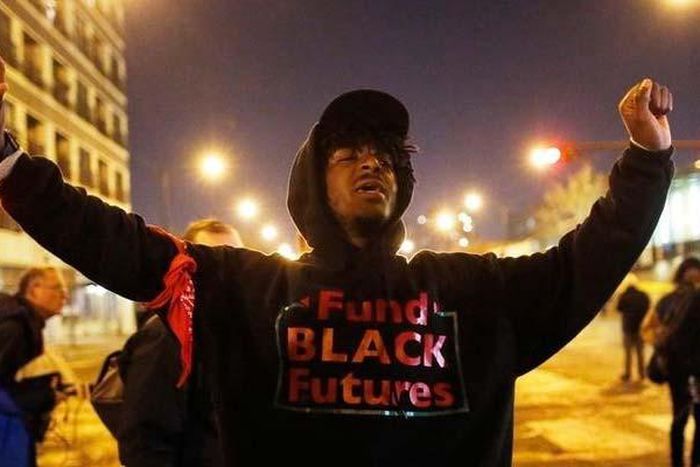 Chicago charges officer in black teen's death, releases video of shooting