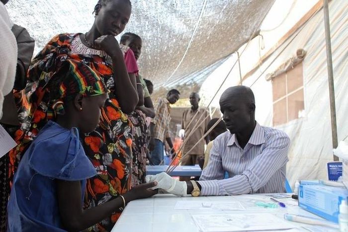 A displaced girl is tested for malaria at an MSF clinic in Tomping camp, where some 17,000 displaced people who fled their homes are being sheltered by the United Nations, in Juba , in a file photo. REUTERS/Andreea Campeanu