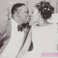 Chuddy K kissing his wife