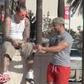 Pretending to bend people's phone prank