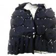 Tailored vest stuffed full of ivory products