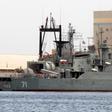 The Iranian frigate Alvand (R) docks in Port Sudan with supply ship Bushehr on May 6, 2014, one of a growing number of naval deployments outside the Gulf