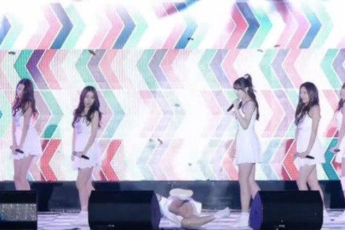 Asian girl band falls on stage 9 times while