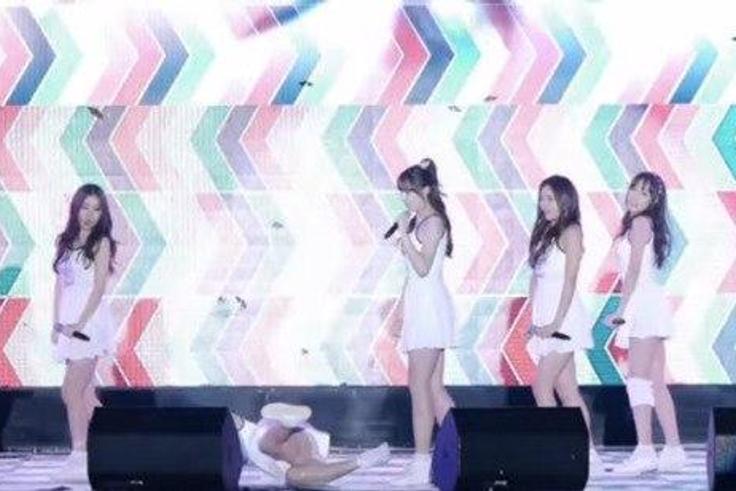 Asian girl band falls on stage 9 times while