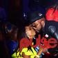 Banky W and Omowunmi Akinnifesi kissing at Elite Model Look