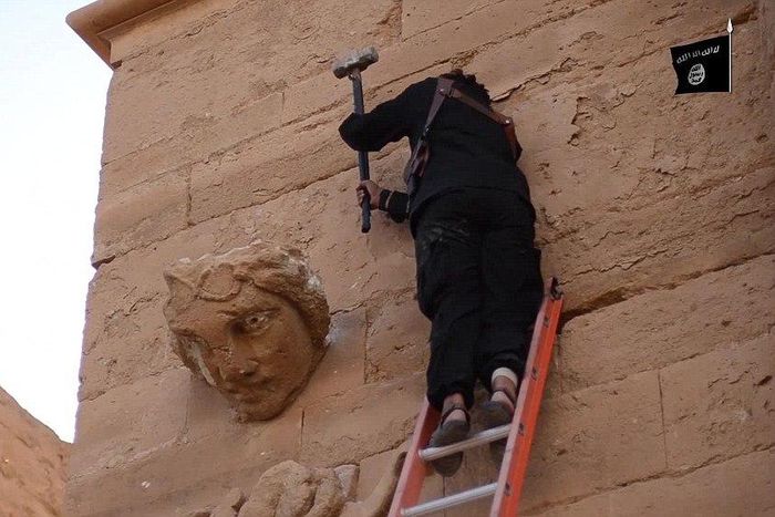 ___4126322___https:______static.pulse.com.gh___webservice___escenic___binary___4126322___2015___9___1___15___27470AC200000578-3025502-In_the_video_ISIS_thugs_balanced_on_top_ladders_are_filmed_smash-a-10_1428150832798