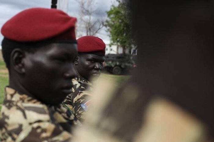 Sudan People's Liberation Army (SPLA) soldiers sit before the start of celebrations on the 31st anniversary of the SPLA in Juba May 16, 2014. REUTERS/Andreea Campeanu