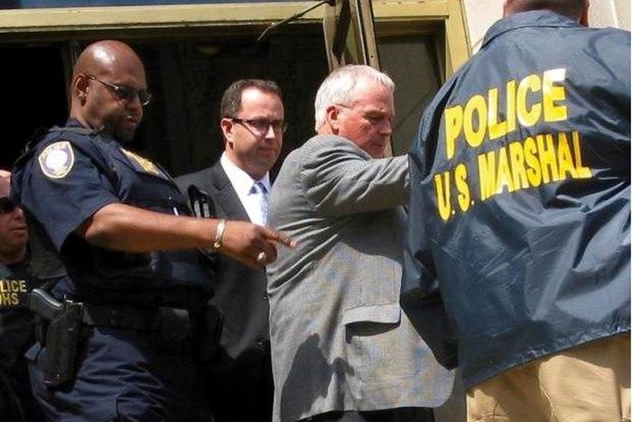 Jared Fogle (C) is led from federal court in Indianapolis, Indiana August 19, 2015. 