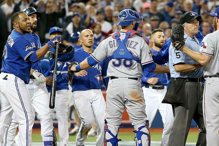 ___4261160___https:______static.pulse.com.gh___webservice___escenic___binary___4261160___2015___10___15___13___benches-clear-in-game-5-of-the-alds-between-the-rangers-blue-jays_1uh4t7rxlkznc1vpkfxc77c8uu