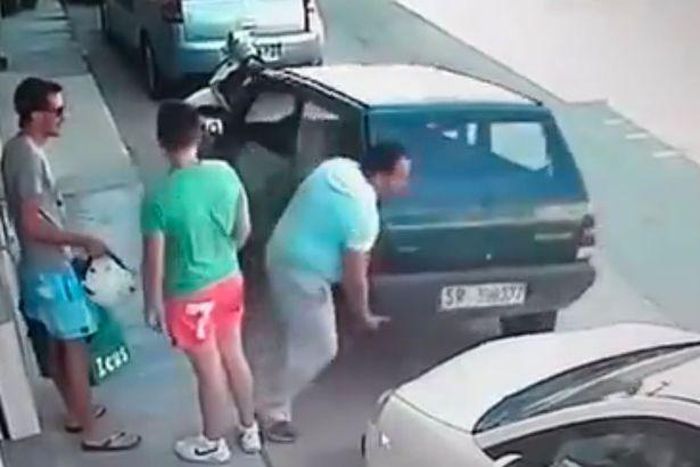 The average-sized man left bystanders confused as he lifted his car up and moved it into the road.