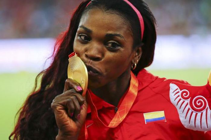 Salsa-dancing Ibarguen waltzes to triple jump gold