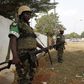 Members of the African peacekeeping forces stand in a street in Bangui February 19, 2014. REUTERS/Luc Gnago