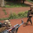 French soldiers walk towards Seleka fighters in Bambari May 31, 2014. Picture taken May 31, 2014. REUTERS/Goran Tomasevic
