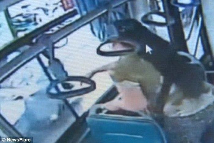 CCTV footage showing a woman jumping out of bus window into oncoming traffic after missing her bus-stop