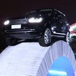 Range Rover SUV on the paper bridge