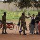 Presidential guard soldiers charge protesters and journalists at Laico hotel in Ouagadougou, Burkina Faso, September 20, 2015.  REUTERS/Joe Penney