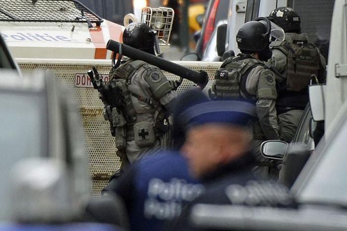 France police raid homes, vow it's "just the beginning