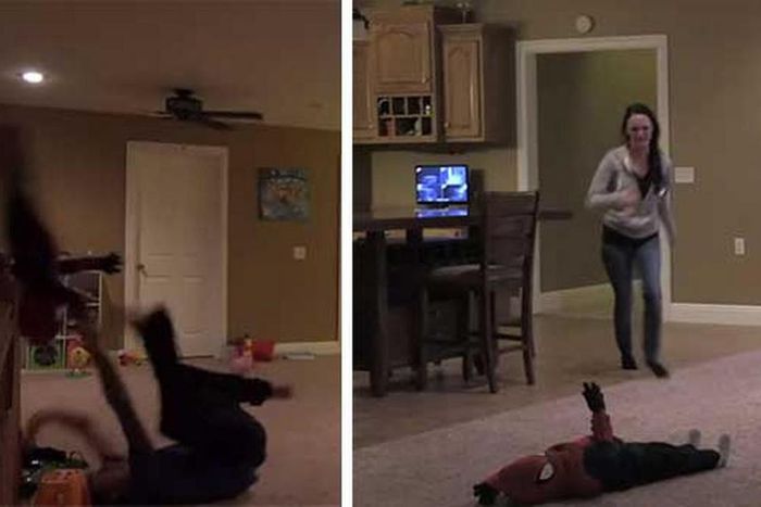 Husband pretends to throw his own son off the balcony in a cruel prank which his wife does not find funny!