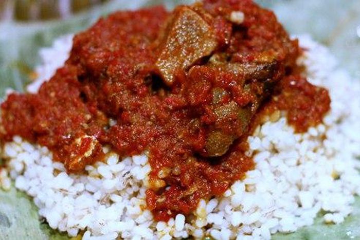 Ofada rice and beef sauce
