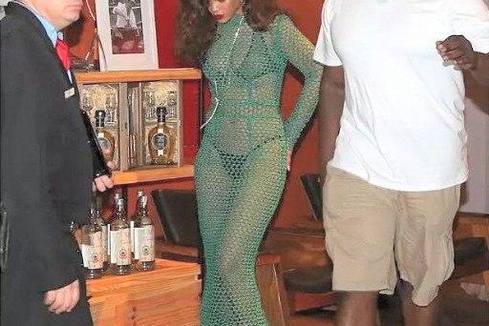 Pop singer, Rihanna, steps out in mesh outfit while in Rio