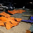 A view of the bodies of dead migrants that were recovered by the Libyan coastguard after a boat sank off the coastal town of Zuwara, west of Tripoli, August 27, 2015. REUTERS/Hani Amara