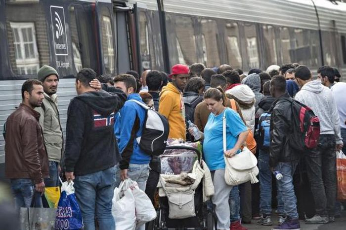 Denmark says it will not join EU refugee quotas, has taken its share