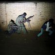 Armed vigilantes patrol in the center of Bujumbura, Burundi, November 20, 2015. REUTERS/Goran Tomasevic