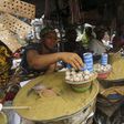 Women sell henna at Adjame's Market ahead of Eid al-Adha in Abidjan, Ivory Coast September 23, 2015. REUTERS/Thierry Gouegnon