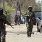 Nigerian soldiers on guard in one of Borno villages.