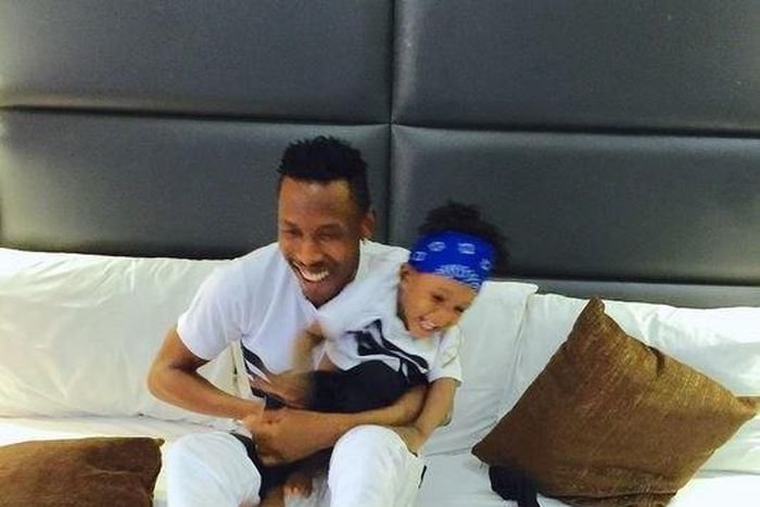 Mr. 2Kay with his son