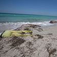Bodies: Migrants desperate to reach Europe take on the treacherous journey across the Mediterranean but hundreds of their bodies have washed up on the beaches of Libya