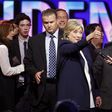 Democratic rivals back Clinton on emails, but little else in scrappy debate