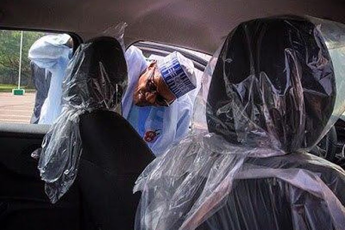 President Buhari inspecting ‘Made-In-Nigeria’ Peugeot car