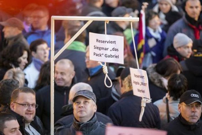 Germany investigates mock gallows for Merkel at anti-Islam rally